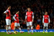 hi-res-454292237-dejected-olivier-giroud-and-mesut-oezil-of-arsenal_crop_north
